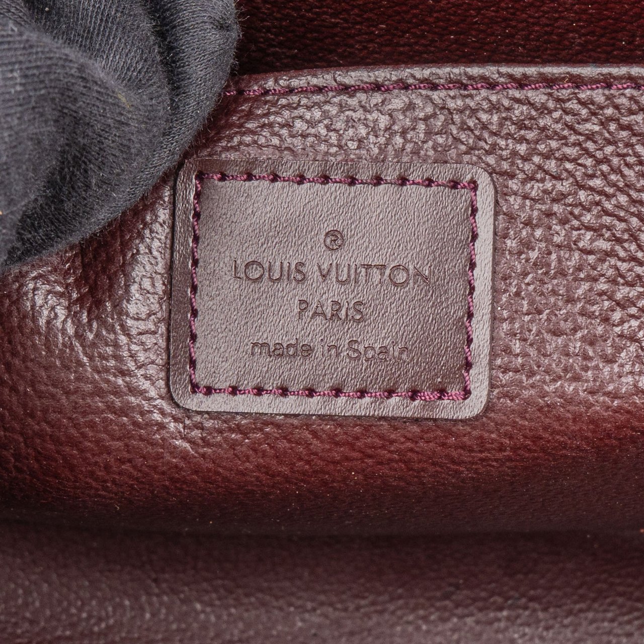 Louis Vuitton Louis Vuitton Taiga Leather Trousse Toilette Handbag Bruin