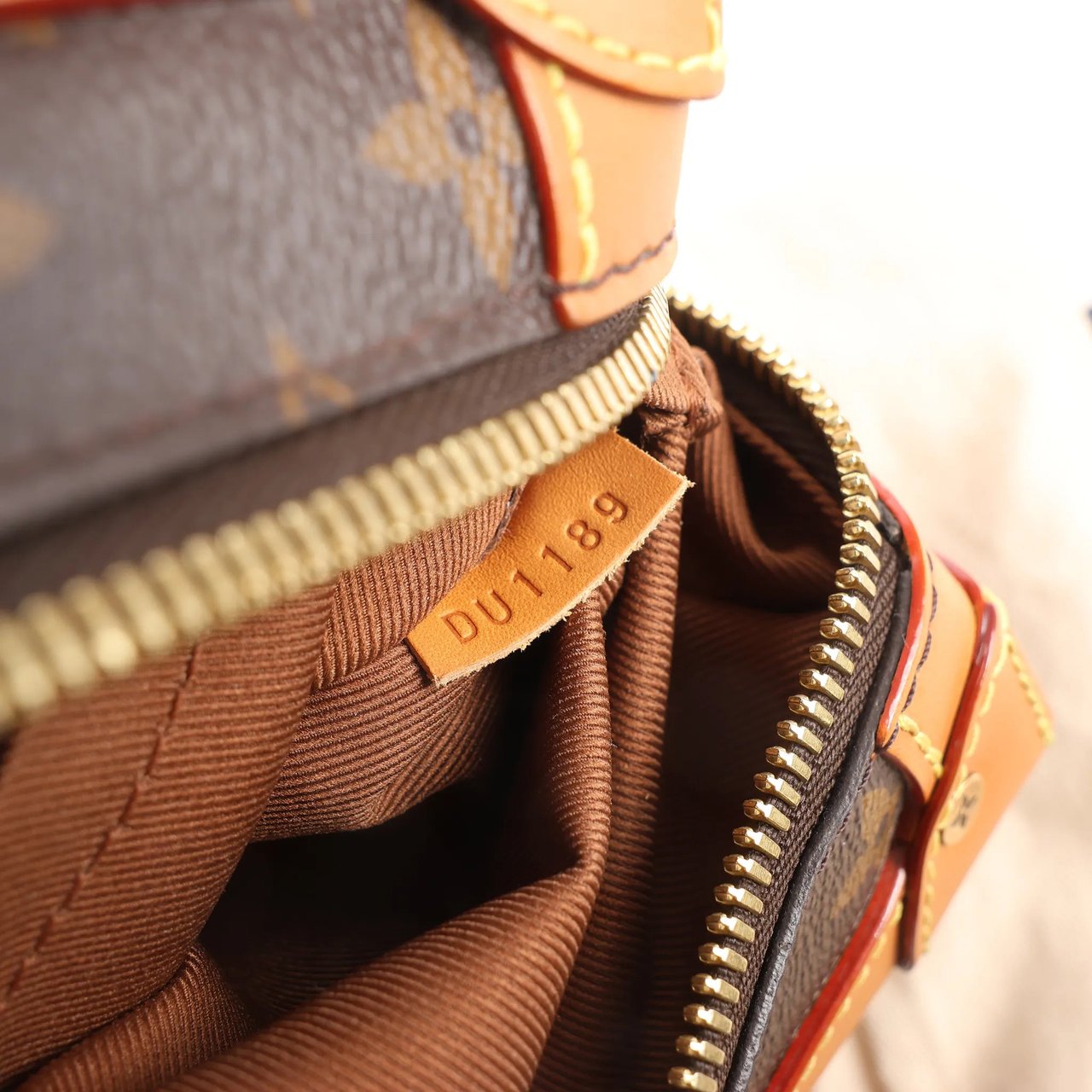 Louis Vuitton Louis Vuitton Soft Trunk Monogram Canvas Crossbody Bag in Brown M44660 Bruin