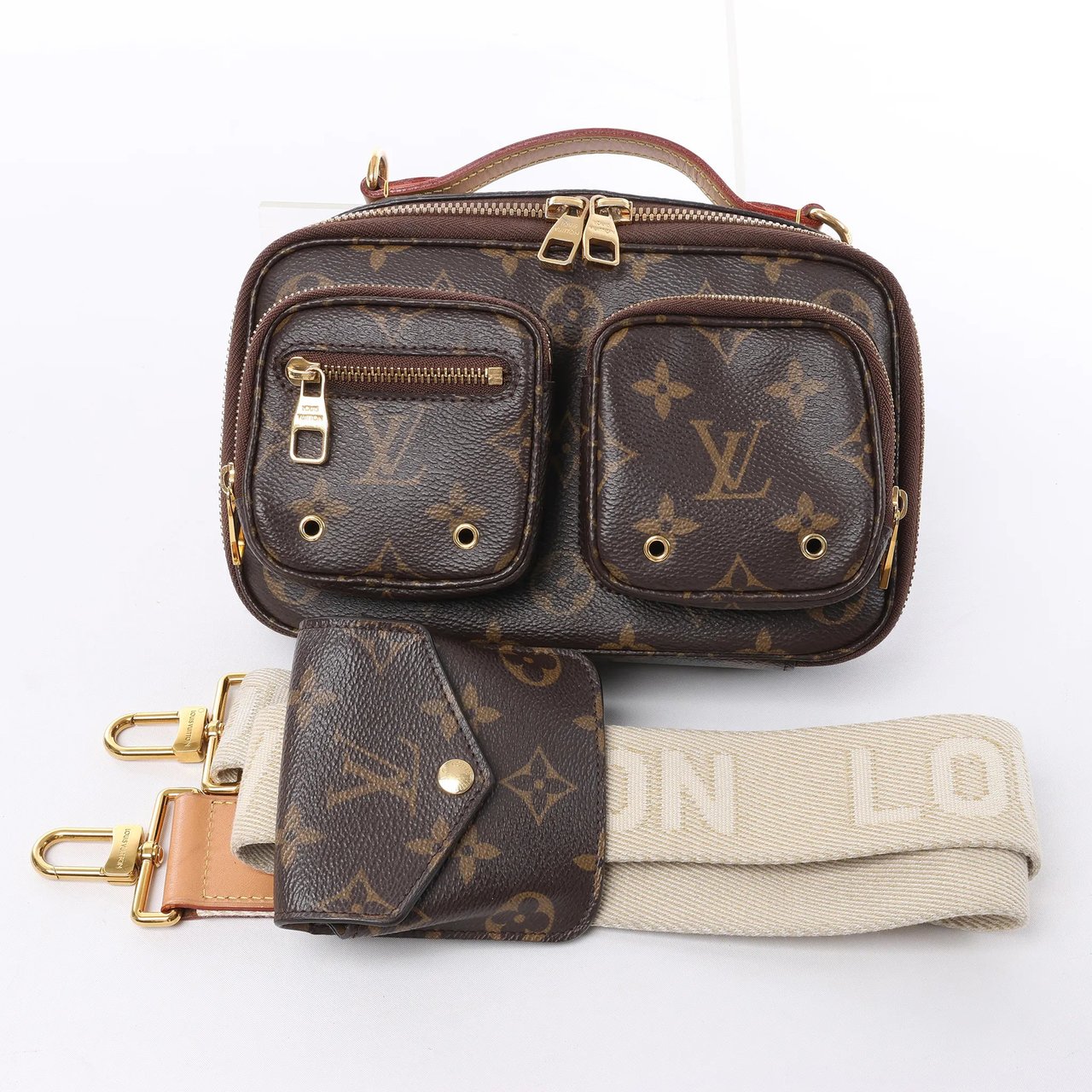 Louis Vuitton Louis Vuitton Utility Monogram Crossbody Bag in Brown M80446 Bruin