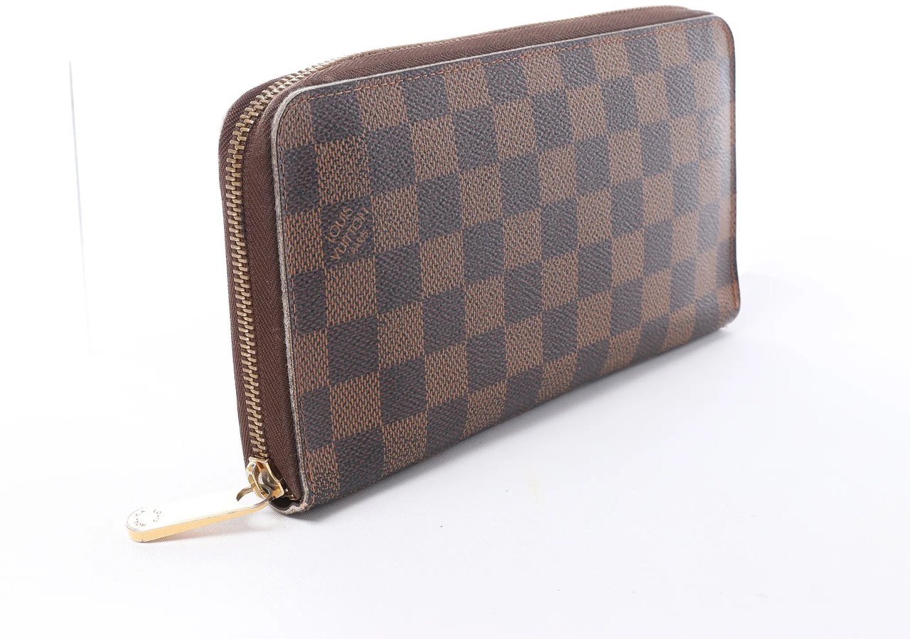 Louis Vuitton Zippy Damier Ebene Wallet in Brown N60003 Bruin