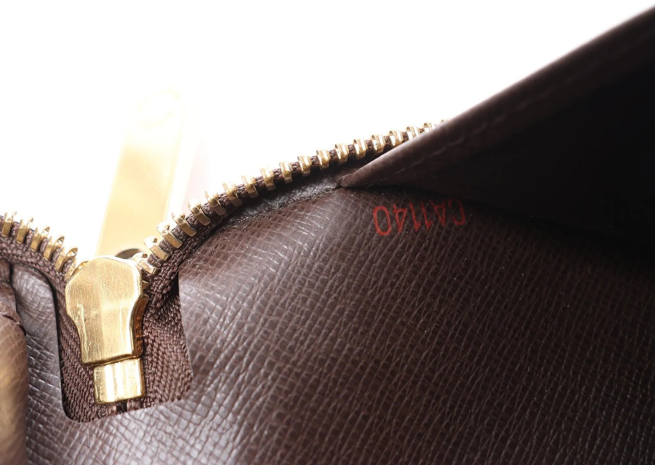 Louis Vuitton Zippy Damier Ebene Wallet in Brown N60003 Bruin
