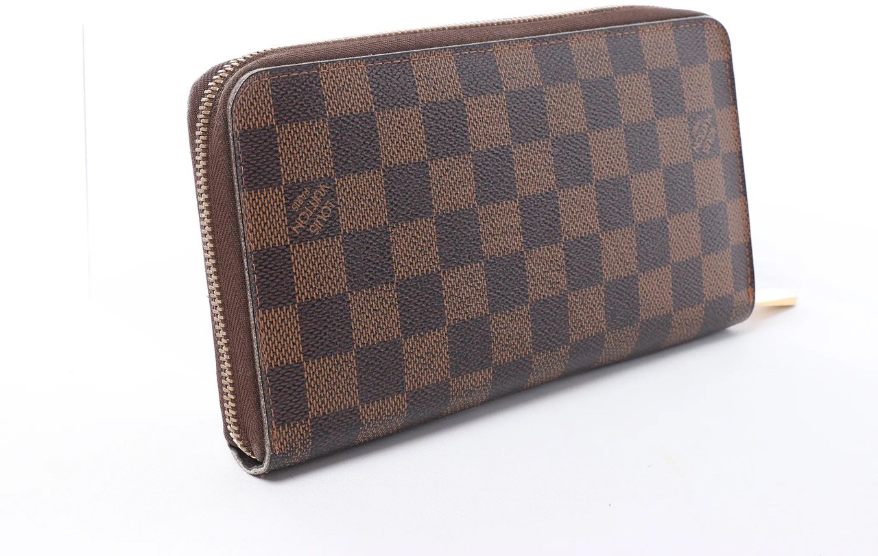 Louis Vuitton Zippy Damier Ebene Wallet in Brown N60003 Bruin