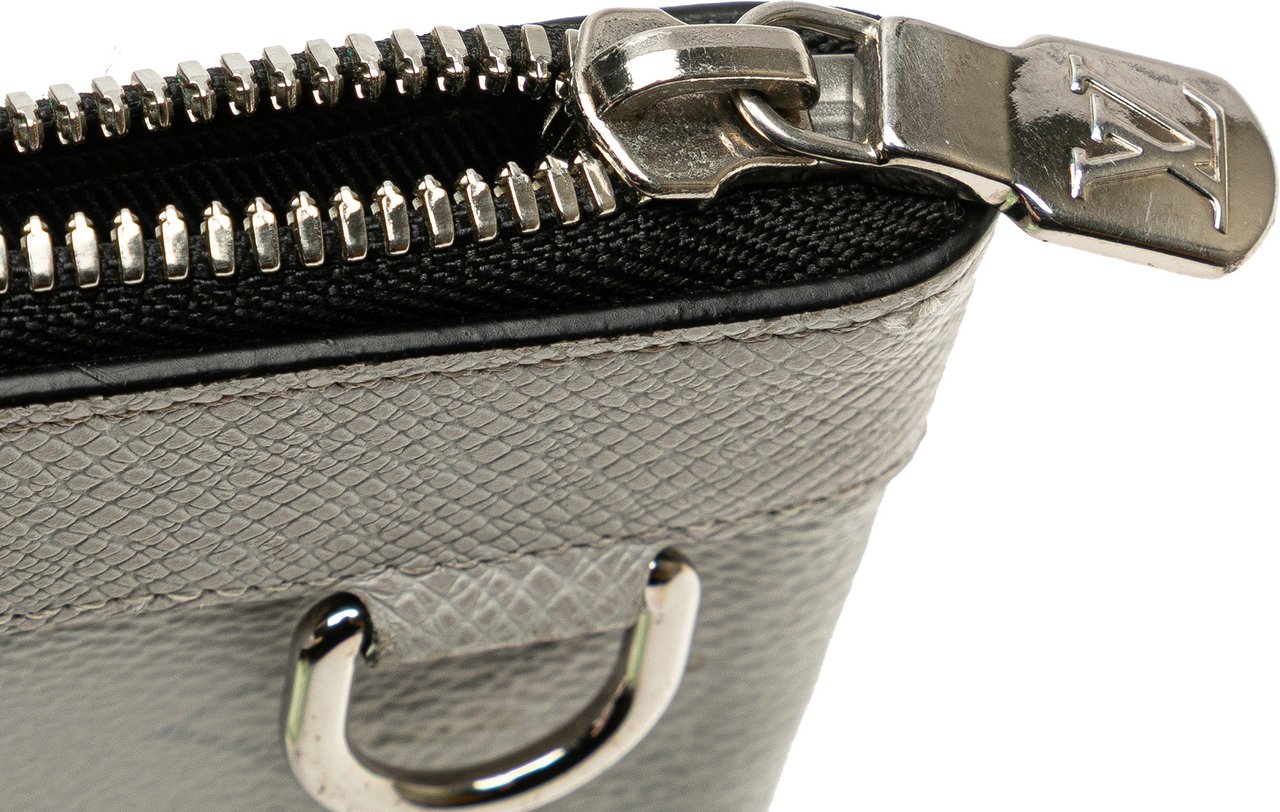 Louis Vuitton Monogram Taigarama Pochette Discovery PM Wit