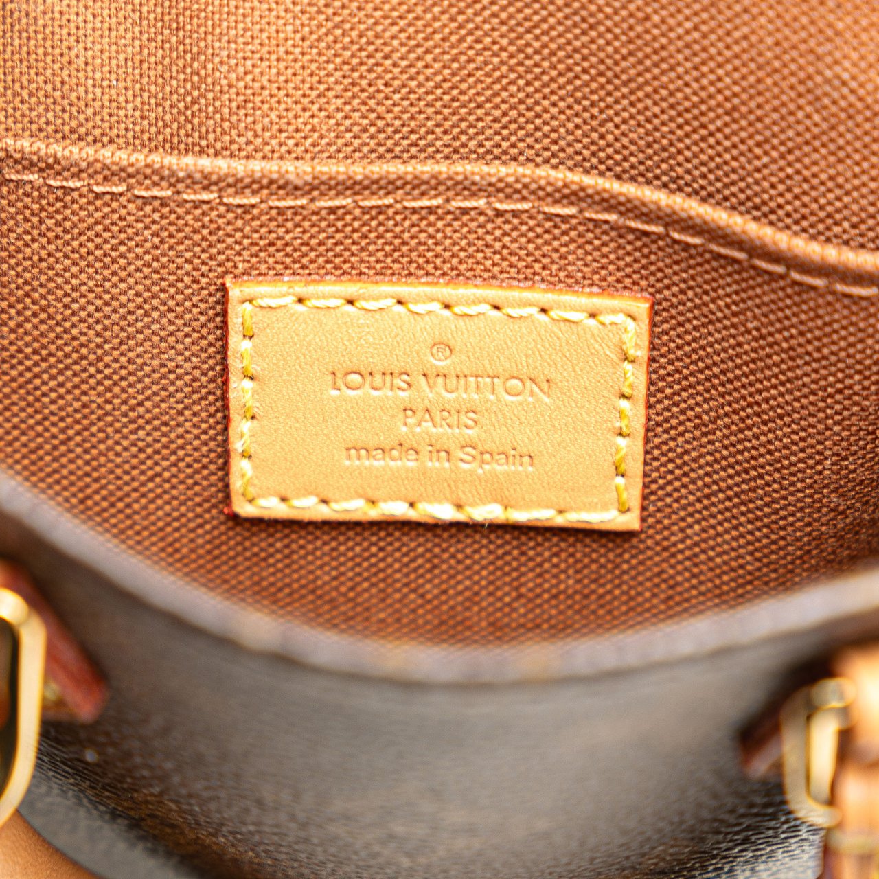 Louis Vuitton Monogram Petit Sac Plat Bruin