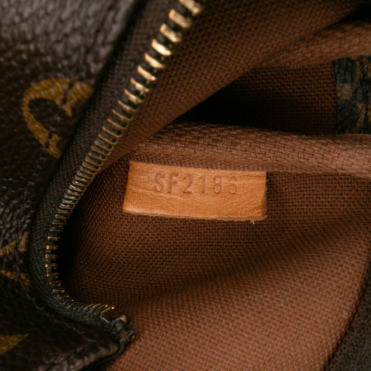 Louis Vuitton Monogram Transatlantic Mini Pochette Accessoires Bruin