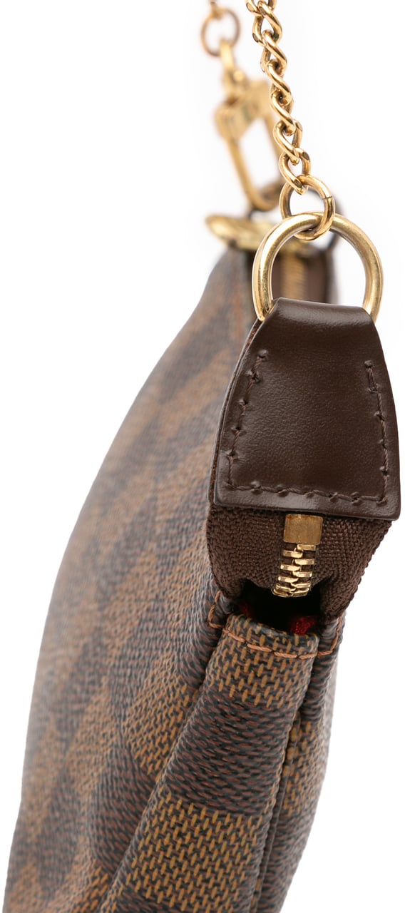 Louis Vuitton Damier Ebene Mini Pochette Accessoires Bruin