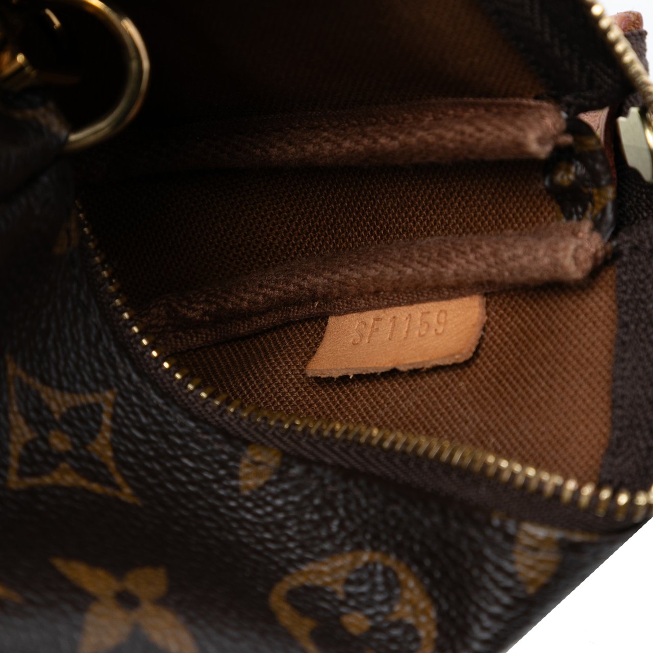 Louis Vuitton Monogram Mini Pochette Accessoires Bruin