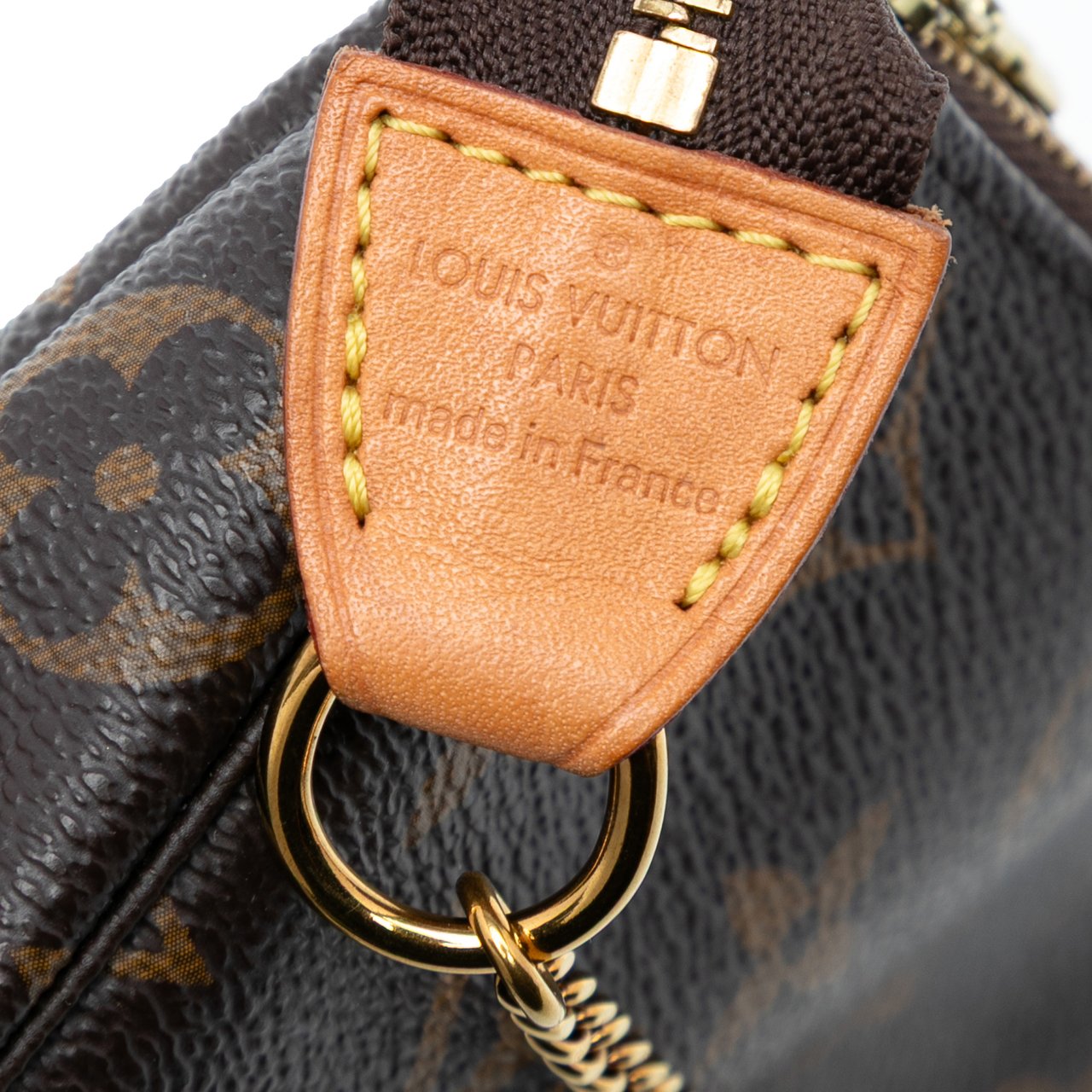 Louis Vuitton Monogram Mini Pochette Accessoires Bruin