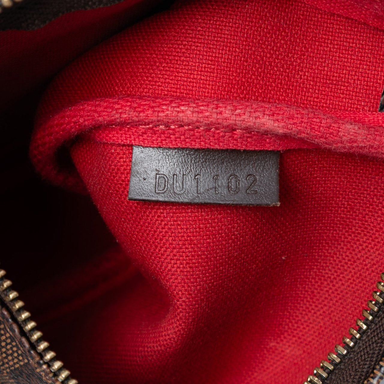 Louis Vuitton Damier Ebene Mini Pochette Accessoires Bruin