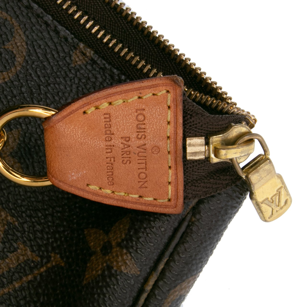 Louis Vuitton Monogram Mini Pochette Accessoires Bruin