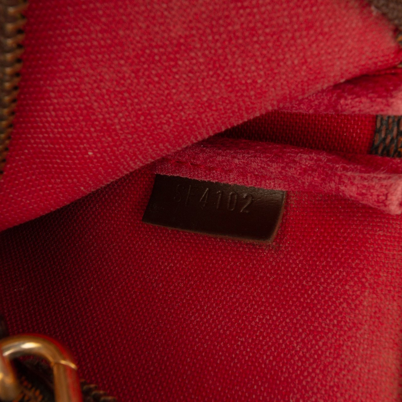 Louis Vuitton Damier Ebene Mini Pochette Accessoires Bruin