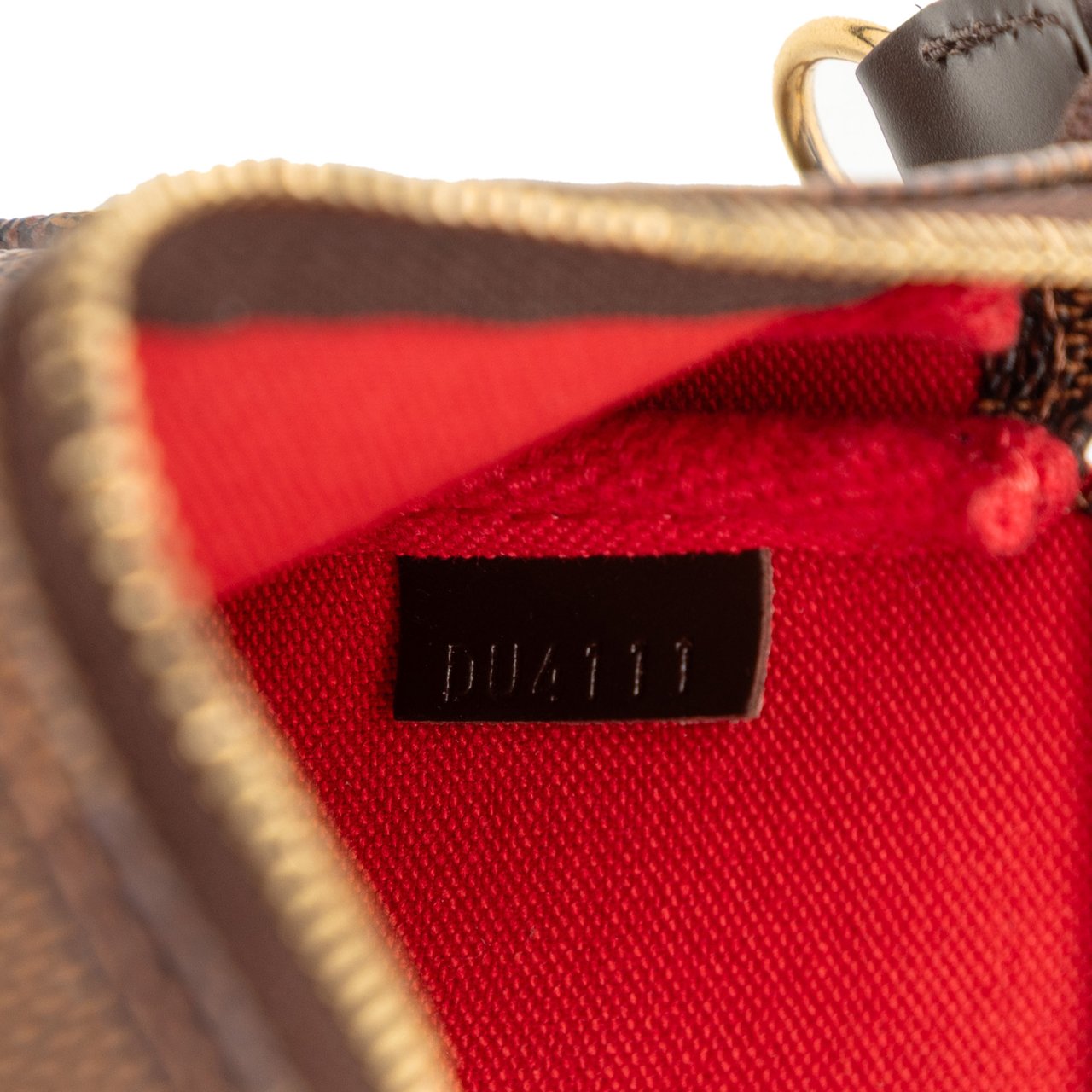 Louis Vuitton Damier Ebene Mini Pochette Accessoires Bruin