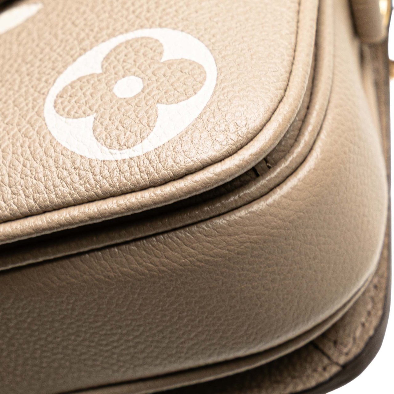 Louis Vuitton Monogram Empreinte Pochette Metis East West Bruin