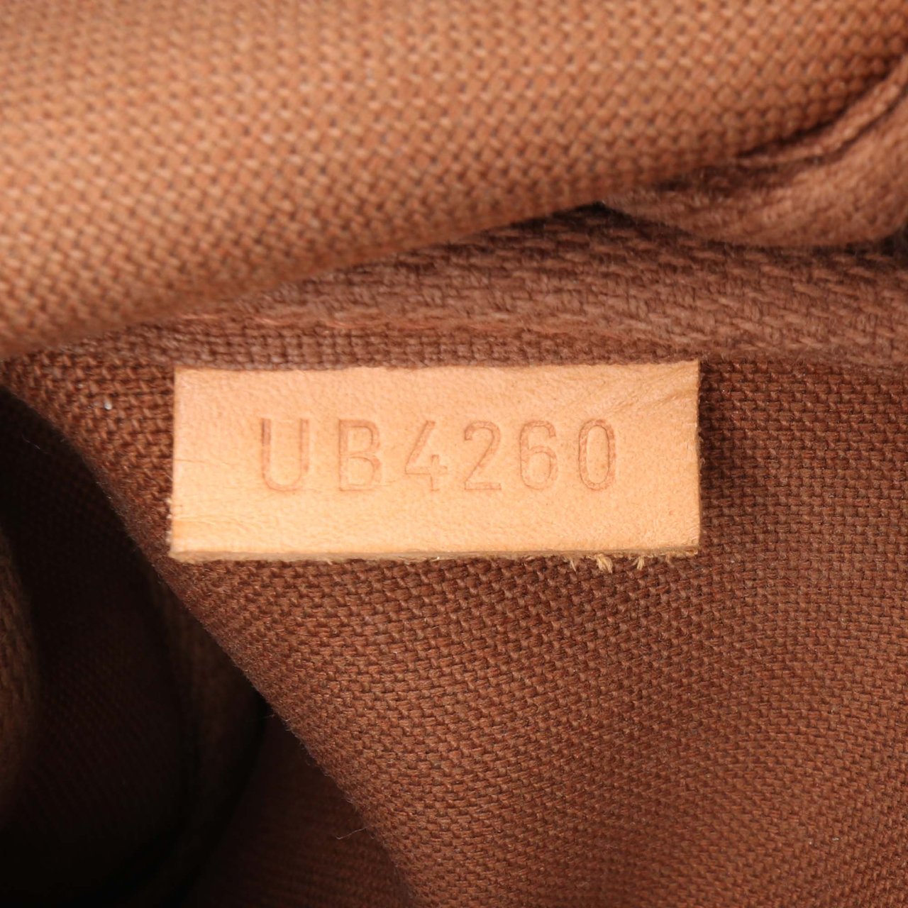 Louis Vuitton Monogram Mini Pochette Accessoires Bruin