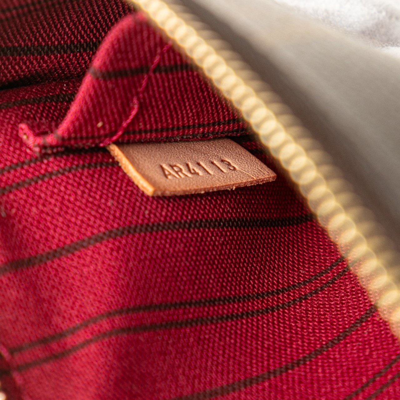 Louis Vuitton Monogram Neverfull Pouch Bruin