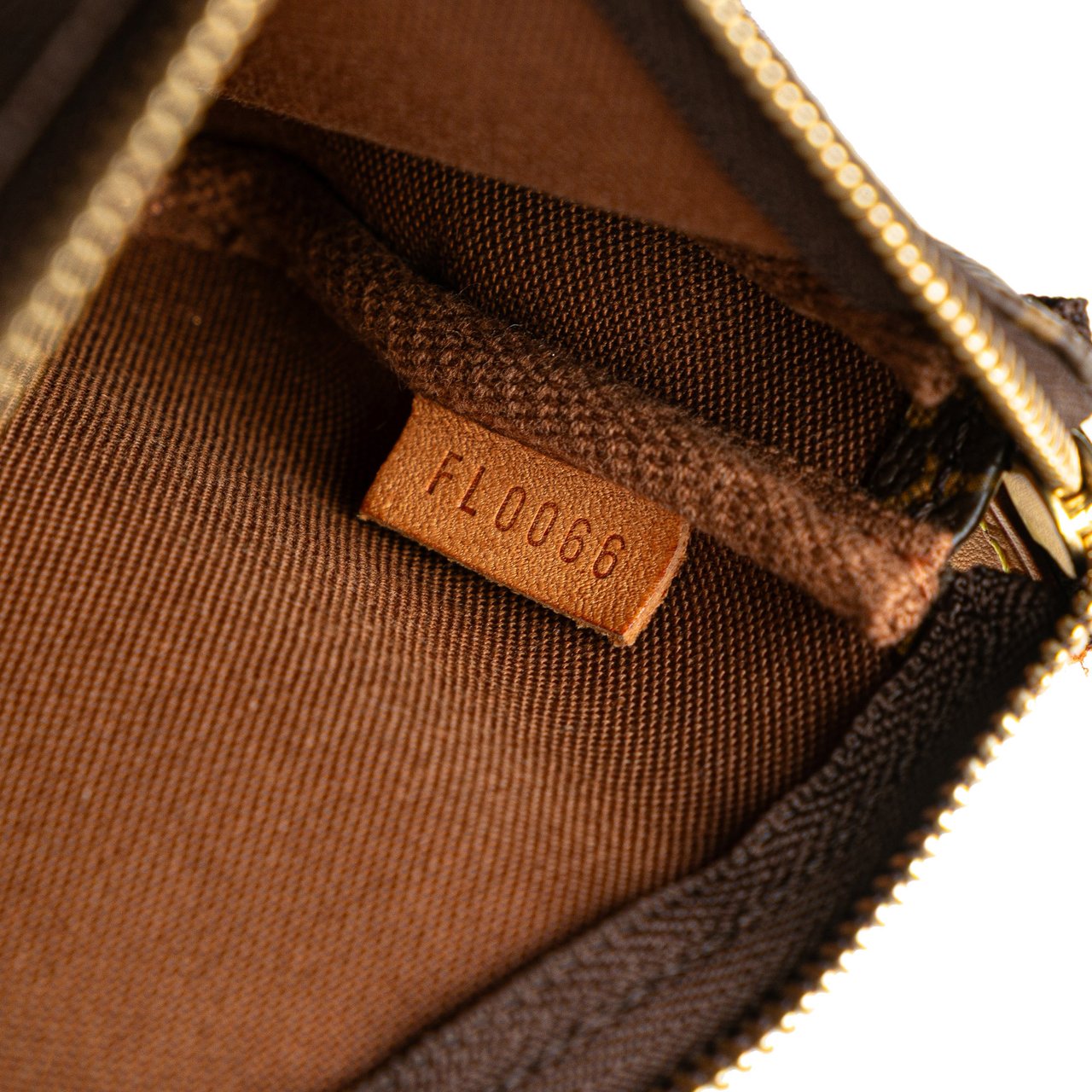 Louis Vuitton Monogram Mini Pochette Accessoires Bruin