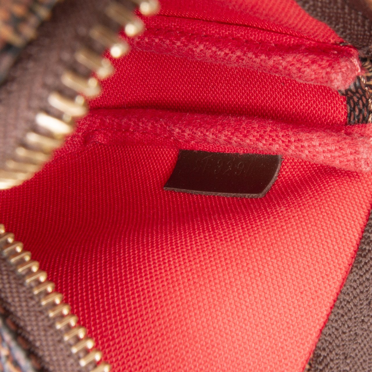 Louis Vuitton Damier Ebene Mini Pochette Accessoires Bruin