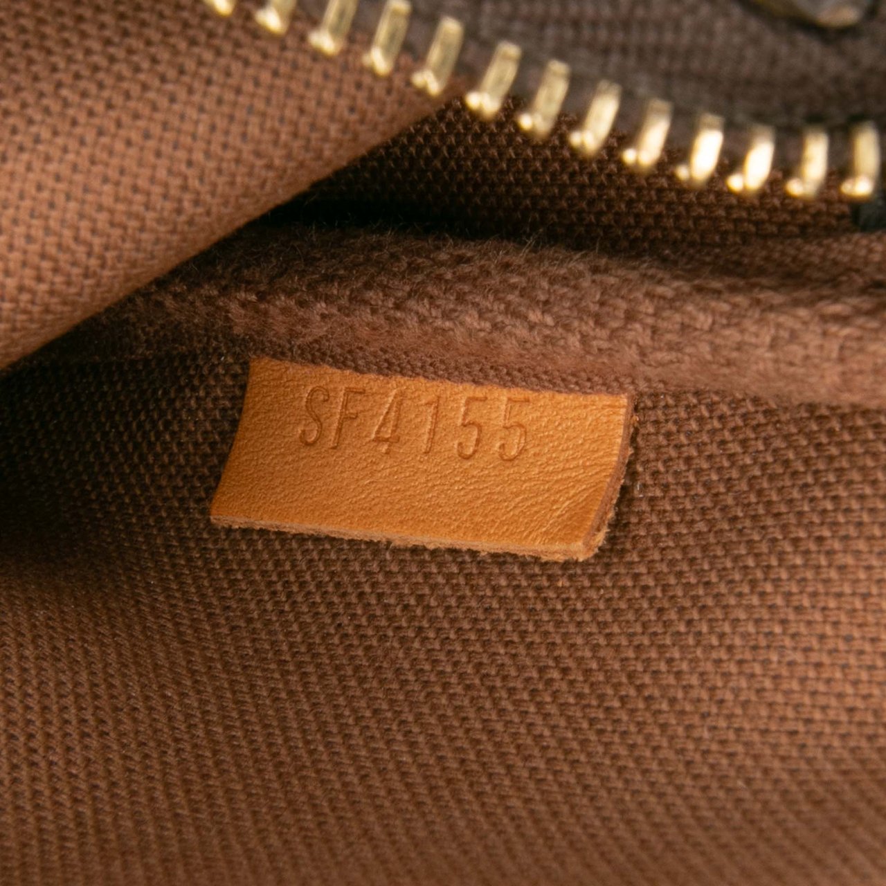 Louis Vuitton Monogram Mini Pochette Accessoires Bruin