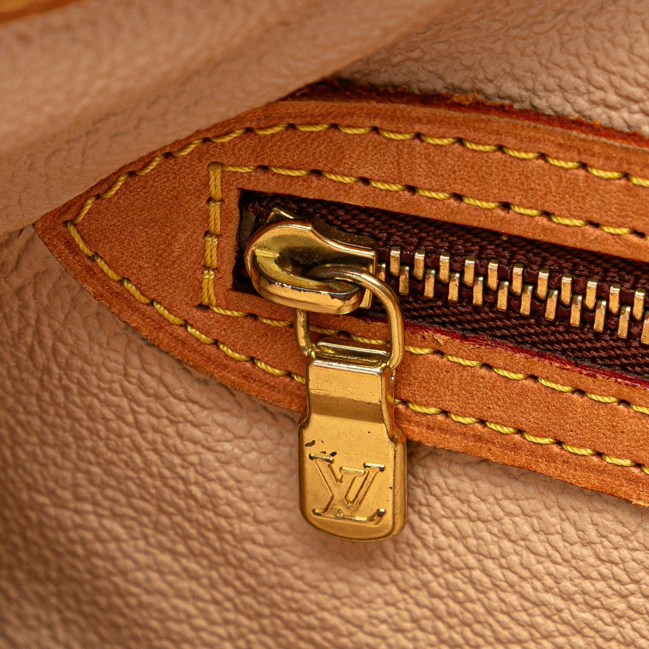 Louis Vuitton Monogram Petit Bucket Bruin