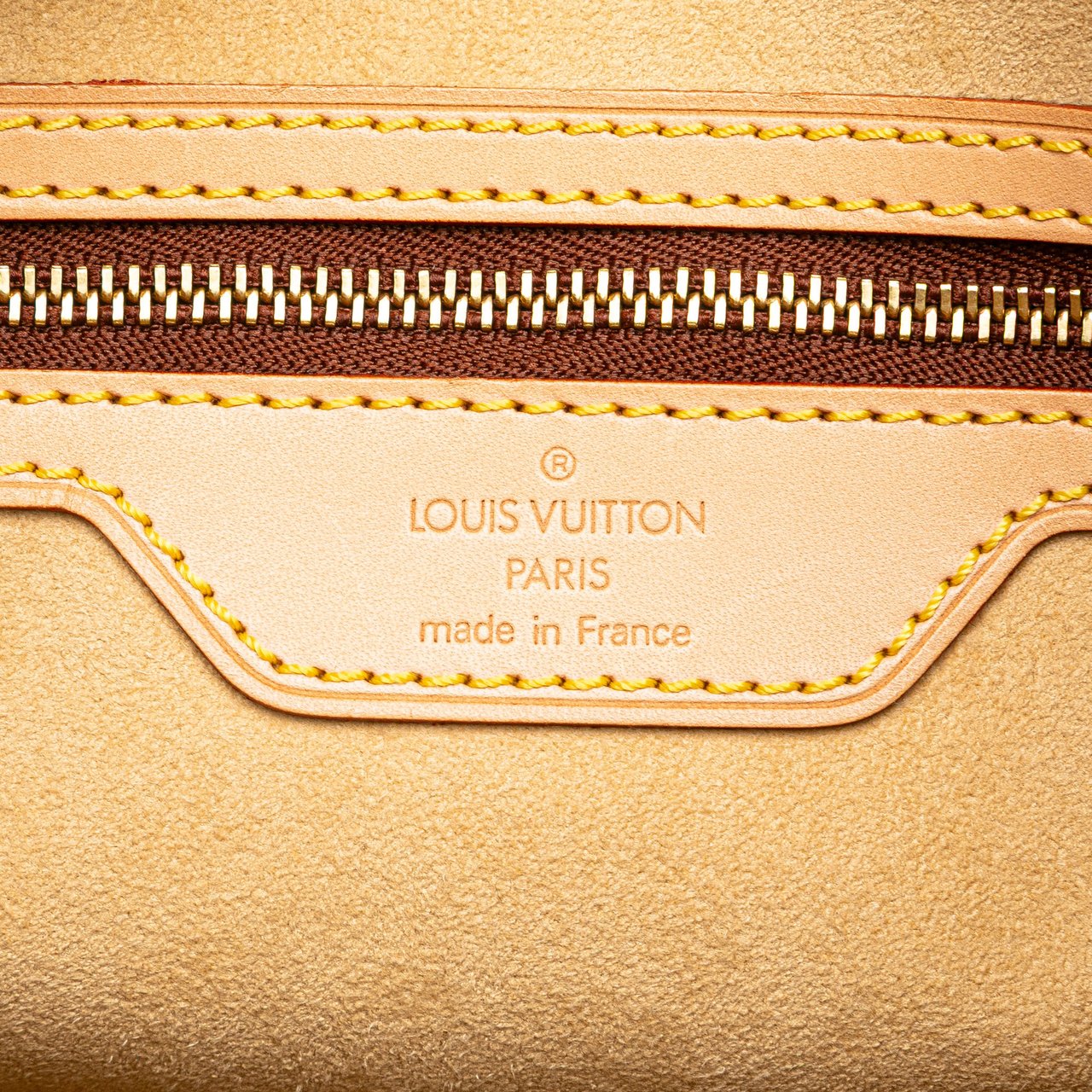Louis Vuitton Nomade Petit Bucket Bruin
