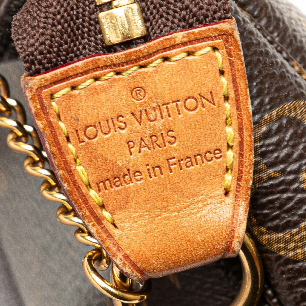 Louis Vuitton Monogram Mini Pochette Accessoires Bruin