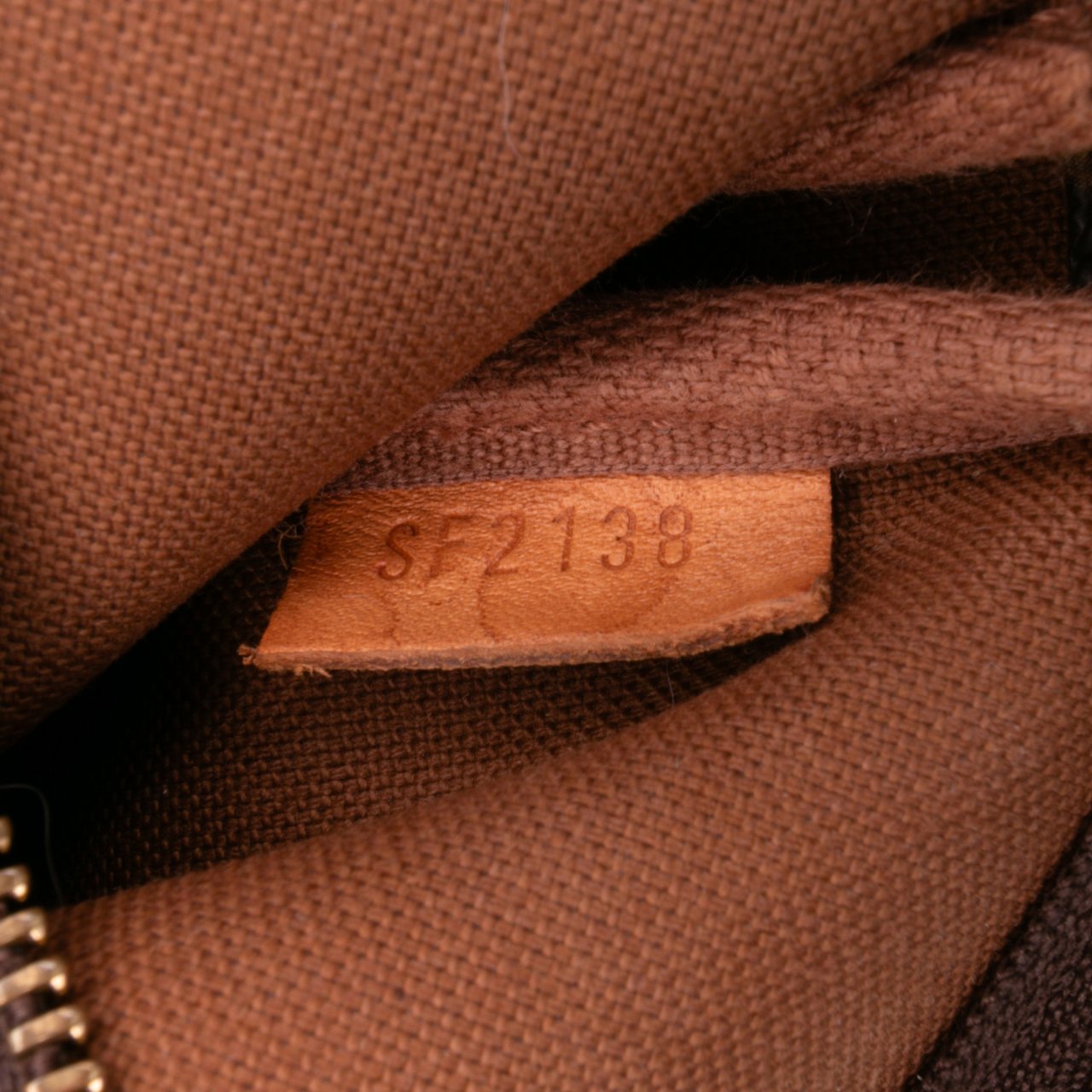 Louis Vuitton Monogram Mini Pochette Accessoires Bruin