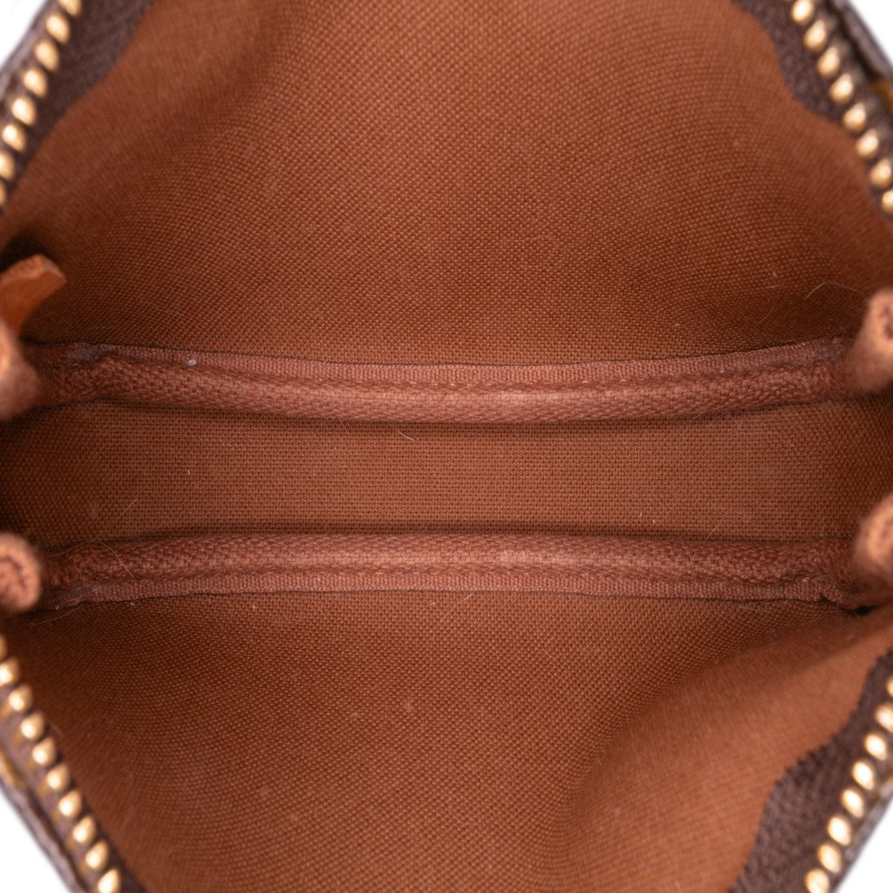 Louis Vuitton Monogram Mini Pochette Accessoires Bruin