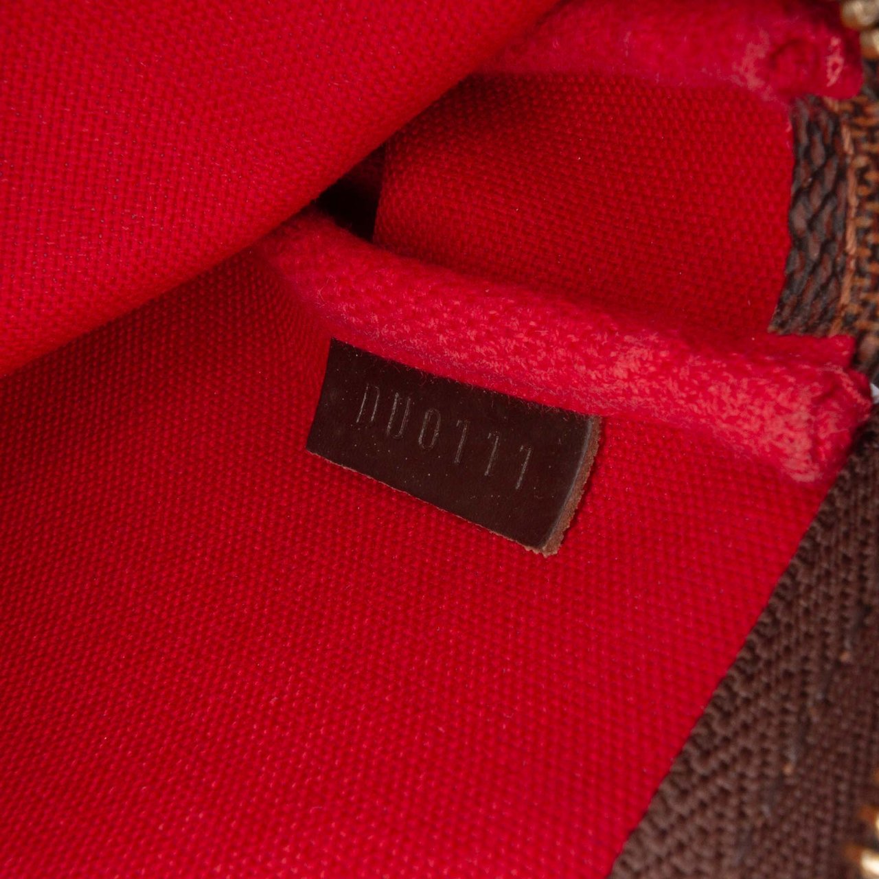 Louis Vuitton Damier Ebene Mini Pochette Accessoires Bruin