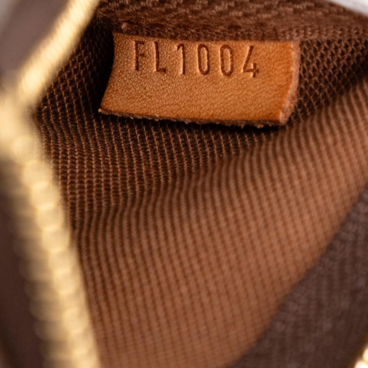 Louis Vuitton Monogram Mini Pochette Accessoires Bruin