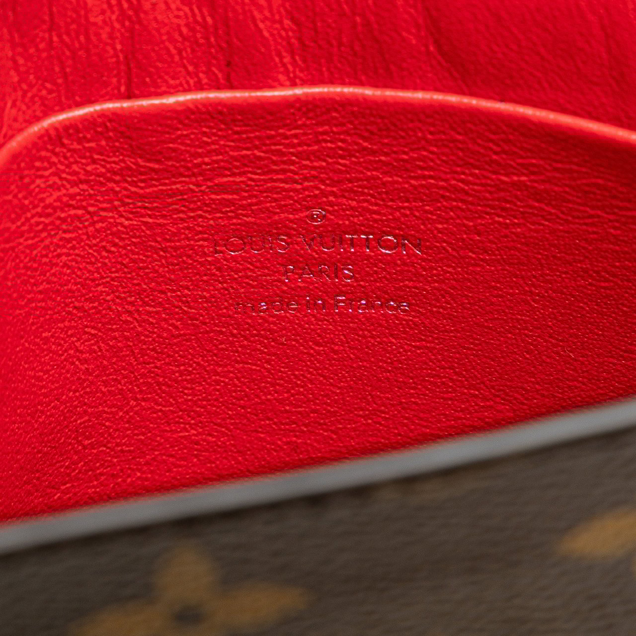 Louis Vuitton Monogram Tribal Mask Pochette PM Bruin