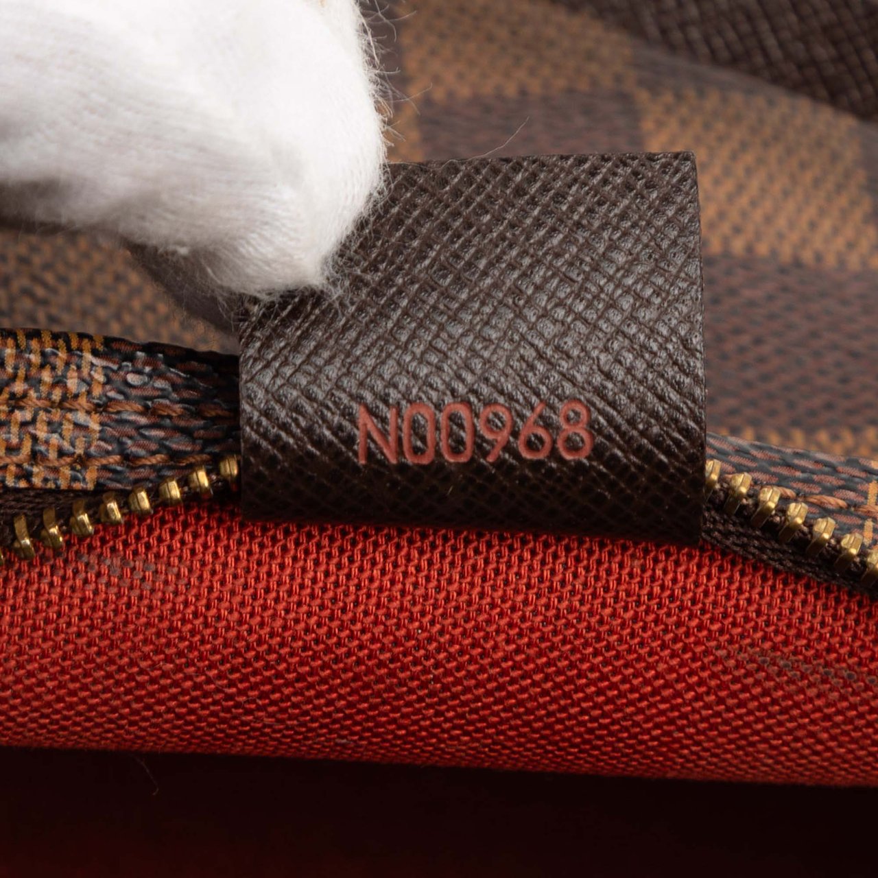 Louis Vuitton Damier Ebene Trousse Pochette Bruin