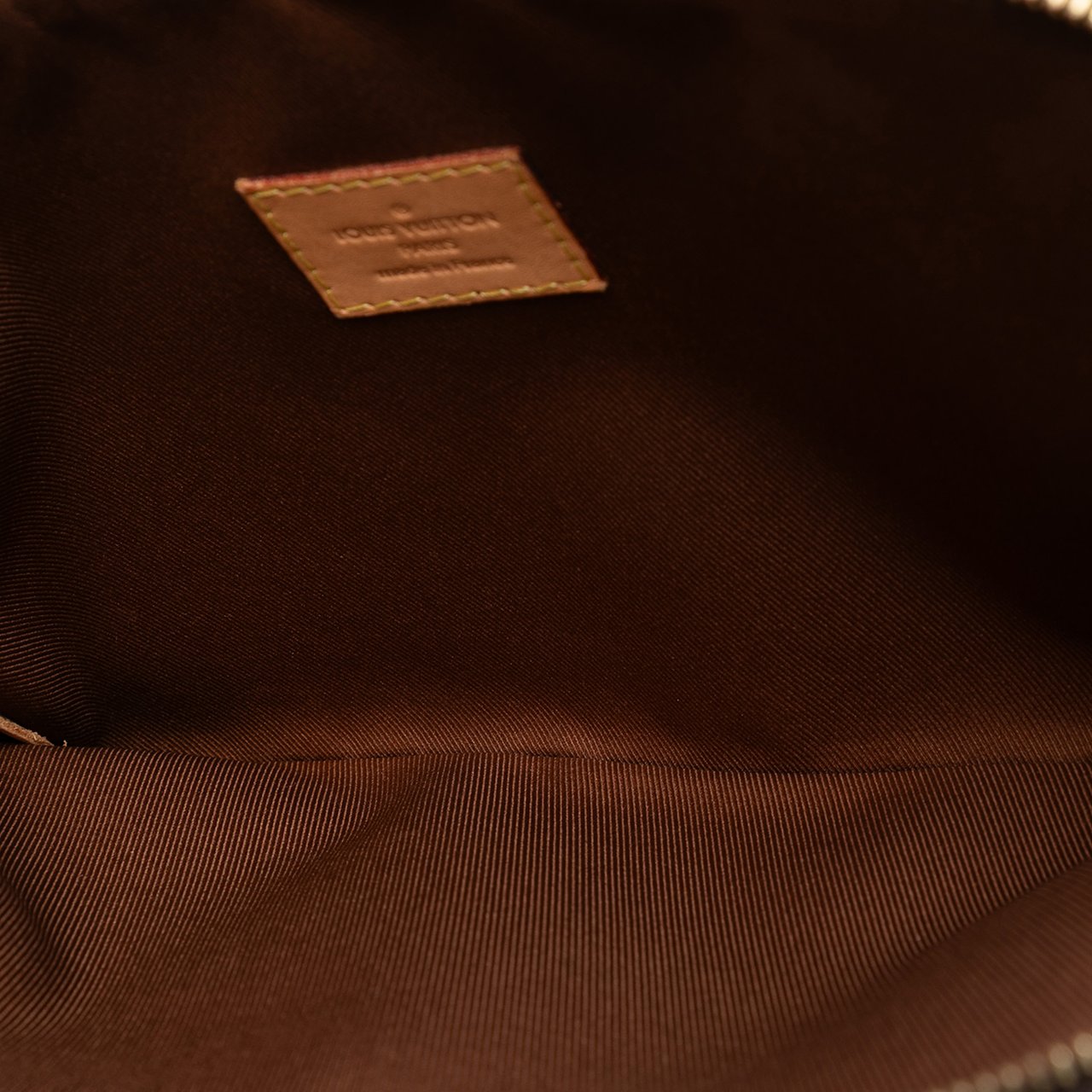 Louis Vuitton Monogram Etui Voyageur PM Bruin