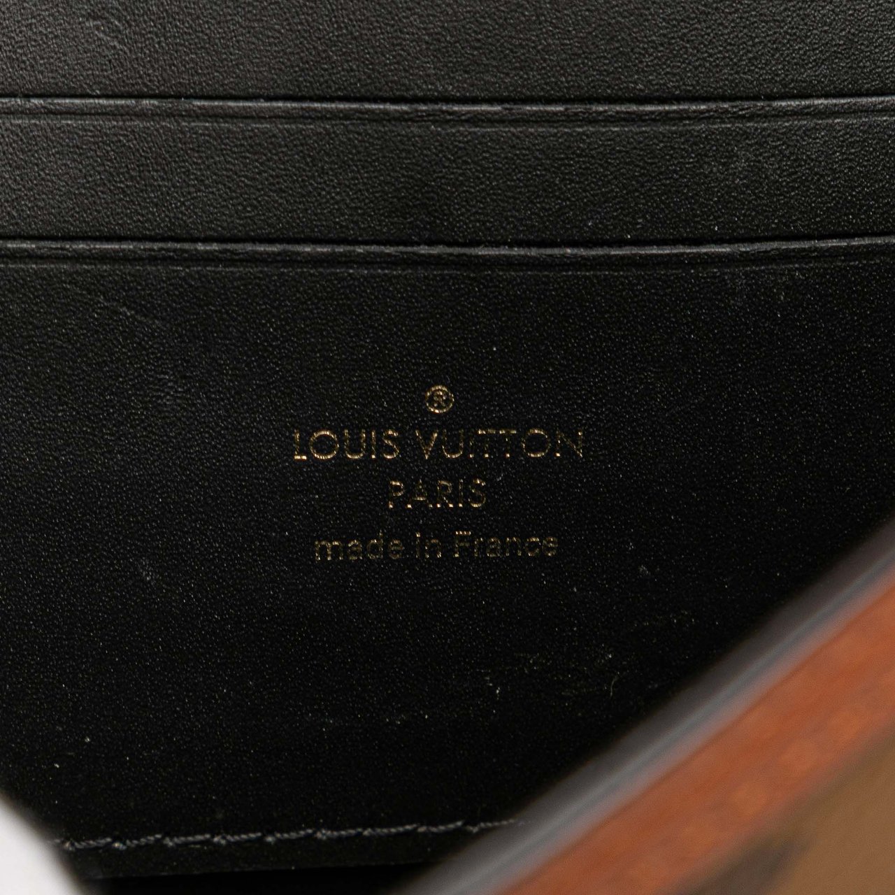 Louis Vuitton Monogram Reverse Dauphine Wallet on Chain Bruin