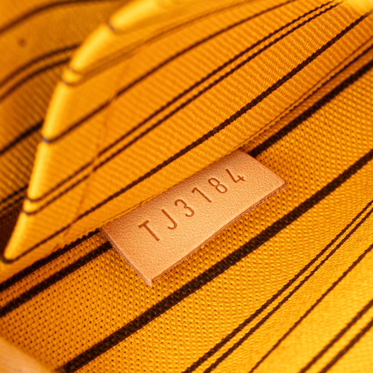 Louis Vuitton Monogram Neverfull Pouch Bruin