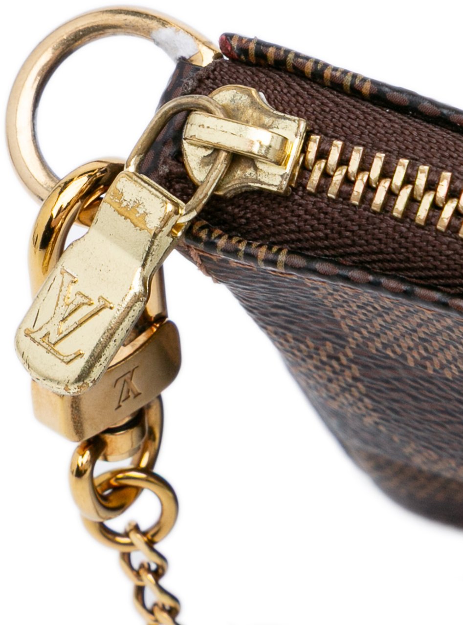 Louis Vuitton Damier Ebene Mini Pochette Accessoires Bruin