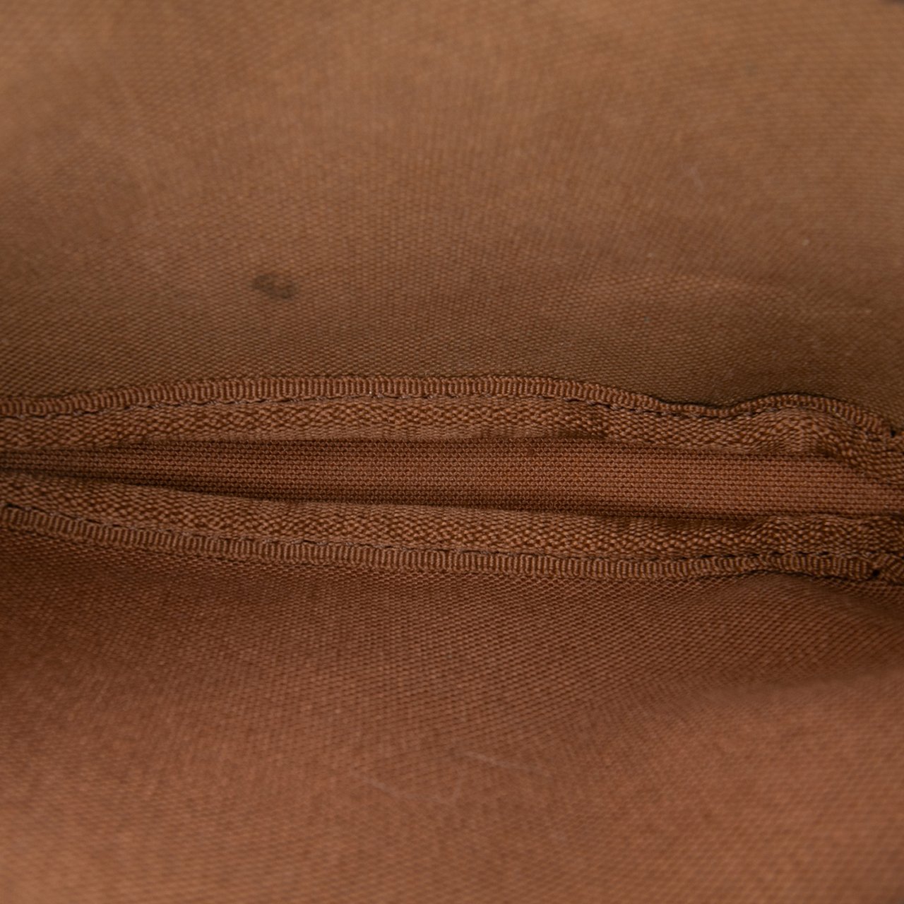 Louis Vuitton Monogram Mini Pochette Accessoires Bruin