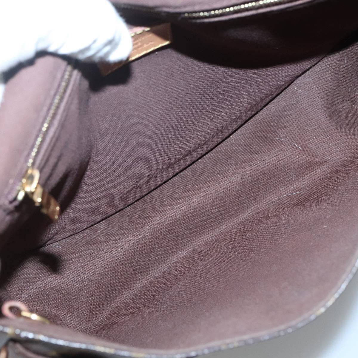 Louis Vuitton Louis Vuitton Menilmontant Handbag Monogram Canvas PM Bruin