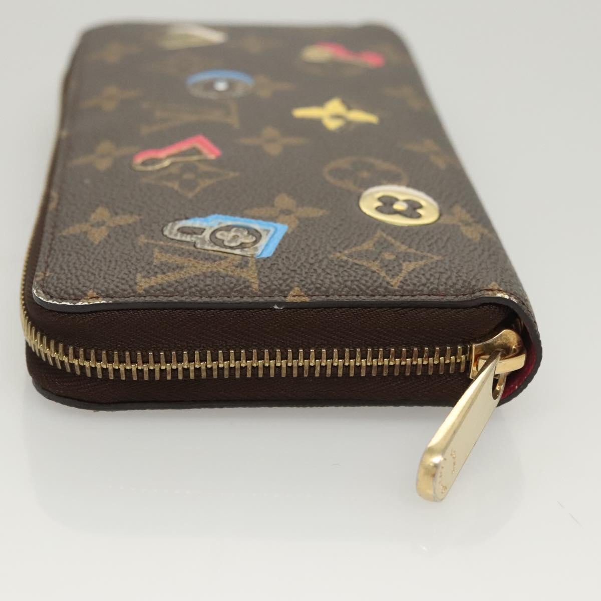 Louis Vuitton Louis Vuitton Zippy Wallet NM Monogram Lovelock Bruin