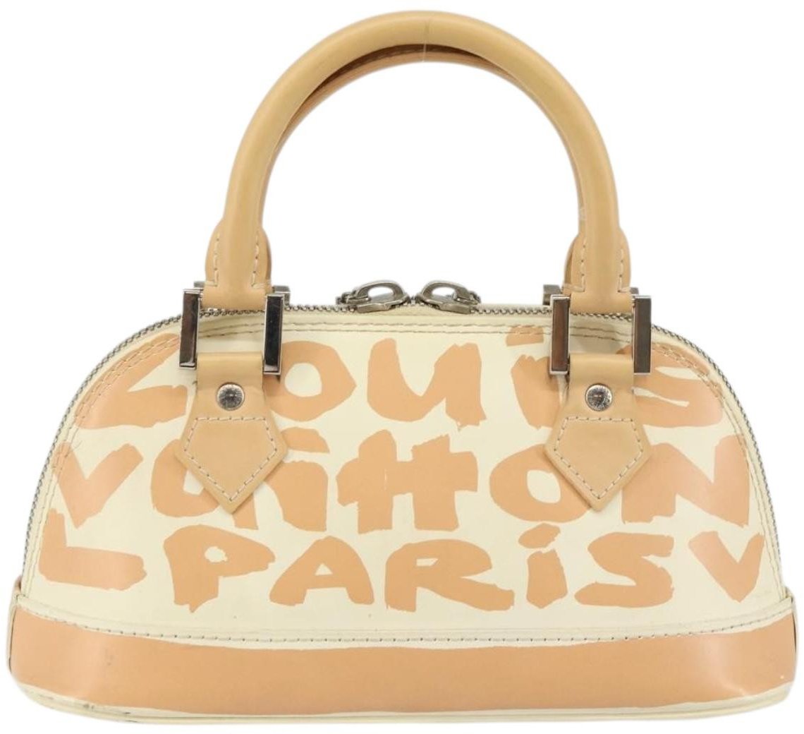 Louis Vuitton Louis Vuitton Alma Handbag Limited Edition Graffiti Leather PM Wit