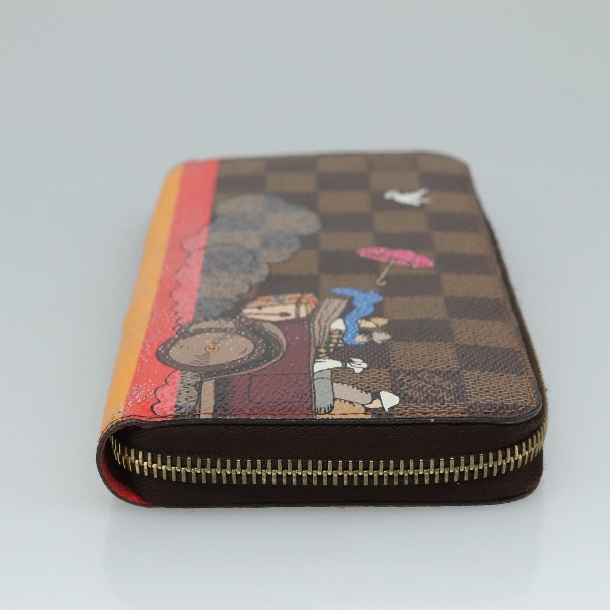 Louis Vuitton Louis Vuitton Porte-Monnaie Zippy Wallet Monogram Evasion Bruin