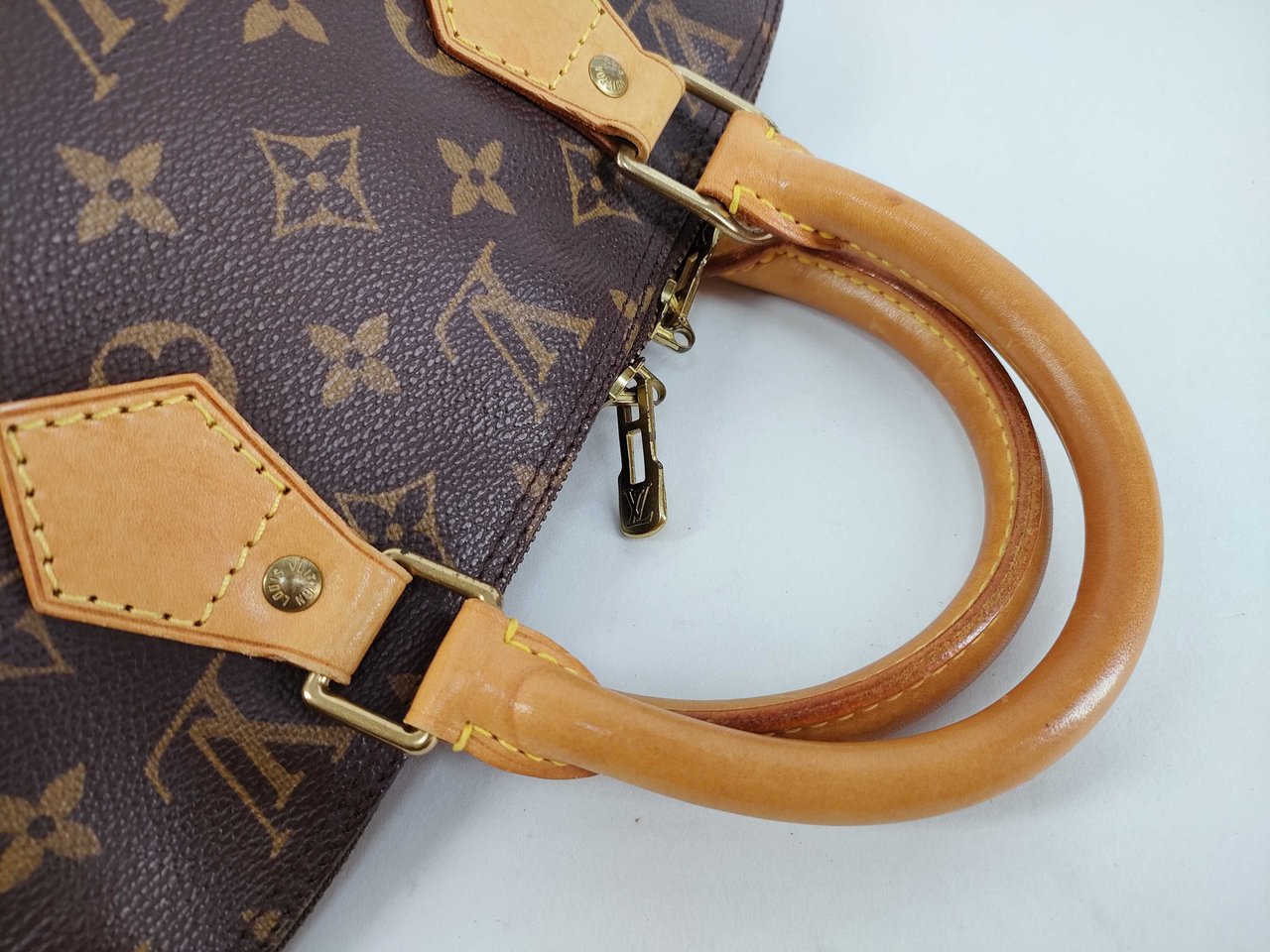 Louis Vuitton Alma Monogram Canvas MM Bruin