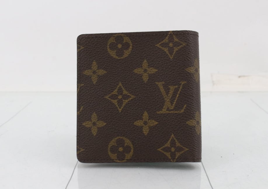 Louis Vuitton Multiple wallet monogram monogram canvas mini Bruin