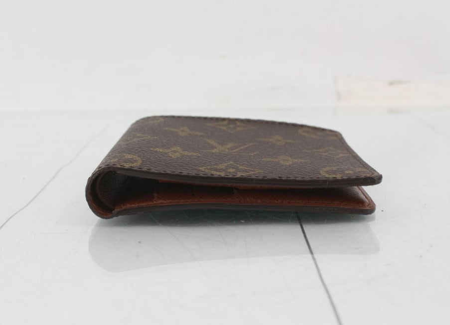 Louis Vuitton Multiple wallet monogram monogram canvas mini Bruin