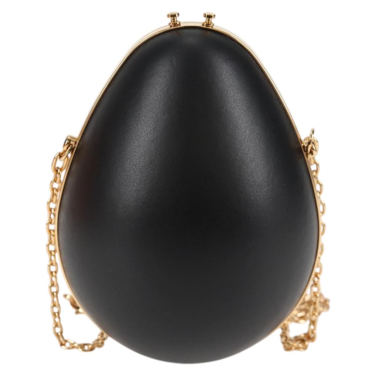 Louis Vuitton Louis Vuitton Egg Case Monogram Canvas and Leather Bruin