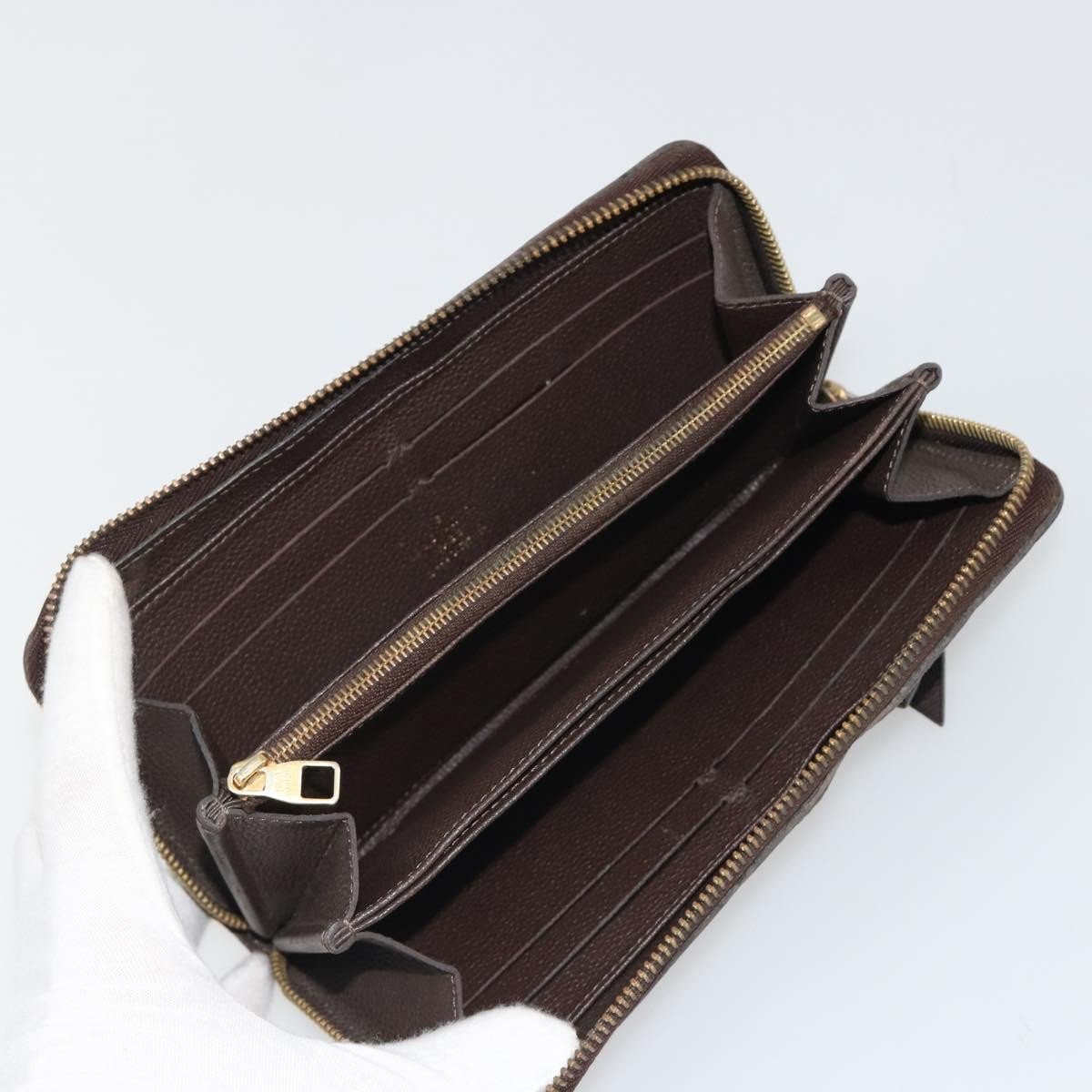 Louis Vuitton Zippy Wallet NM Leather Empreinte Bruin