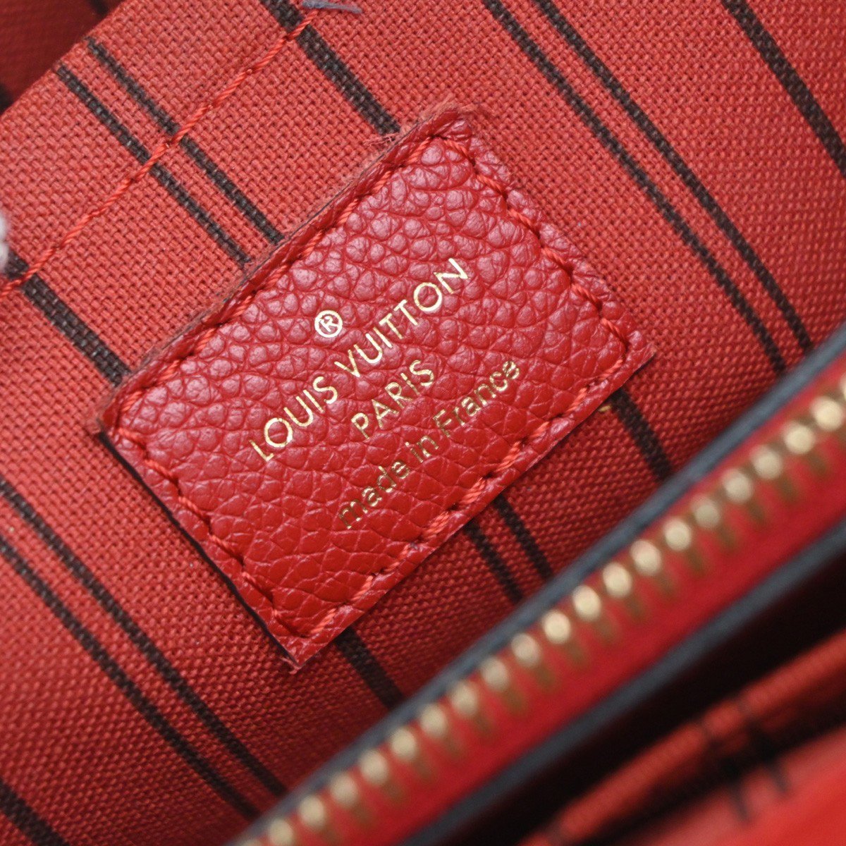 Louis Vuitton Montaigne Handbag Monogram Empreinte Leather MM Rood