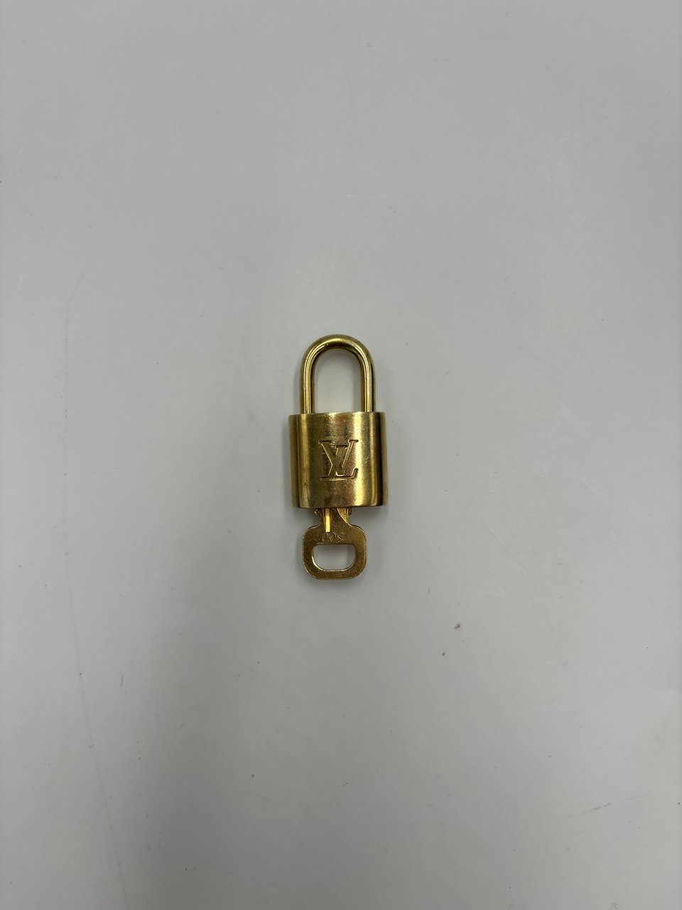 Louis Vuitton Padlock and Key Logo Cufflinks Metal No size available Goud