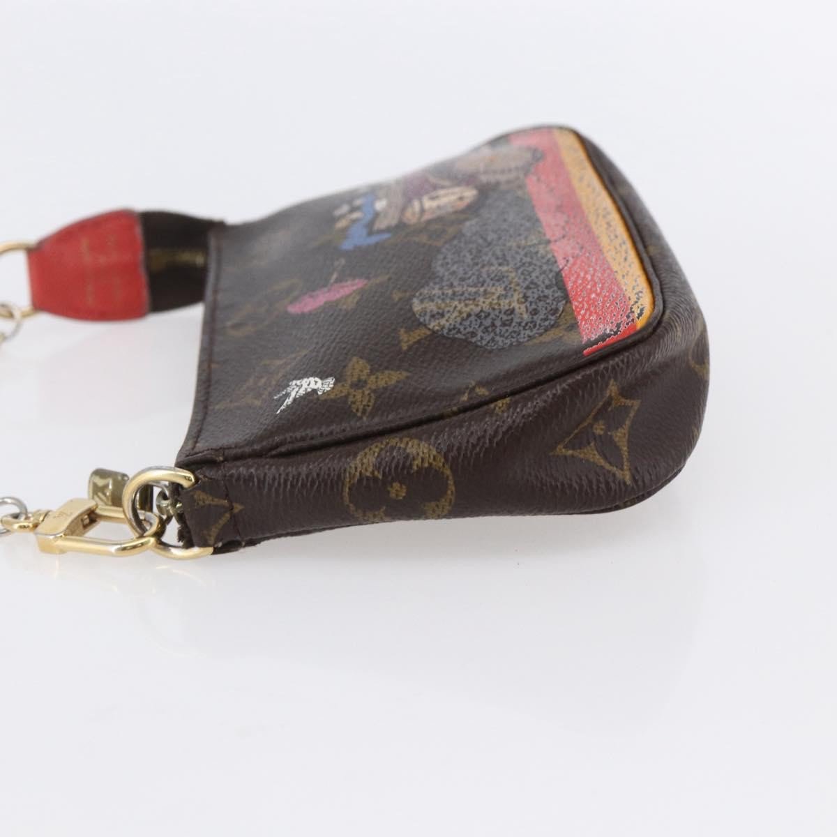 Louis Vuitton Pochette Accessoires Limited Edition Christmas Animation Monogram Canvas Mini Divers