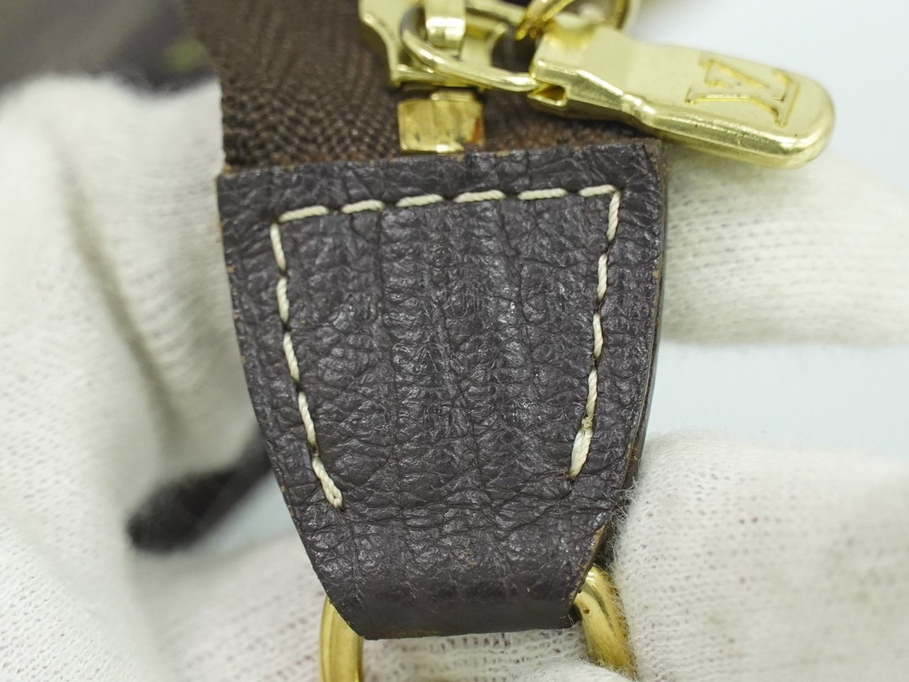 Louis Vuitton Louis Vuitton Mini pochette accessoire Min Lin Canvas Bruin
