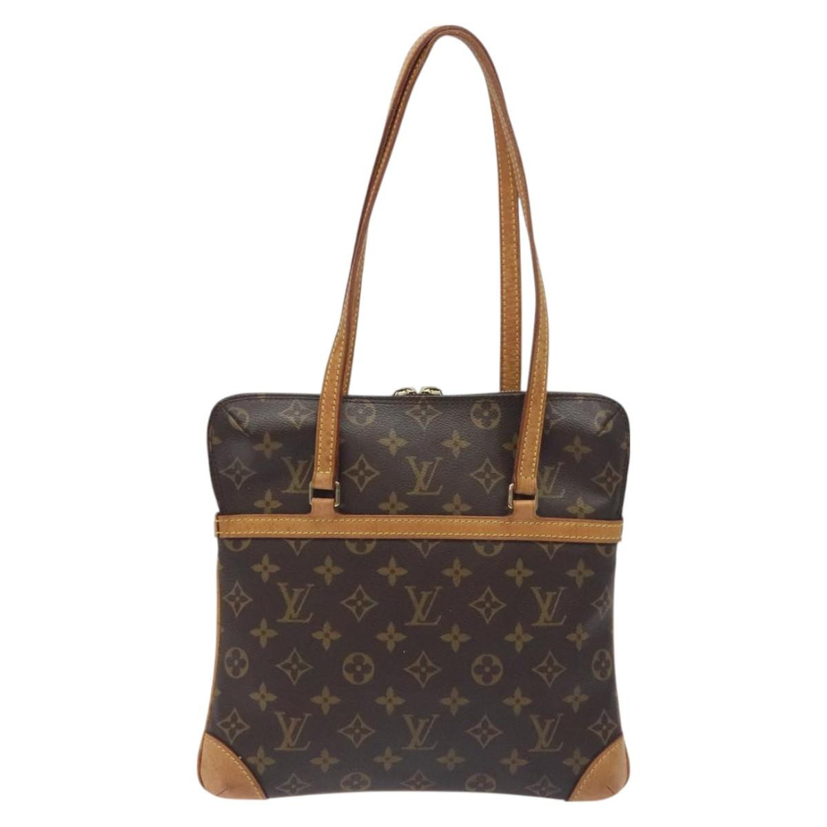 Louis Vuitton Louis Vuitton Coussin Bag Monogram Embossed Lambskin BB Bruin